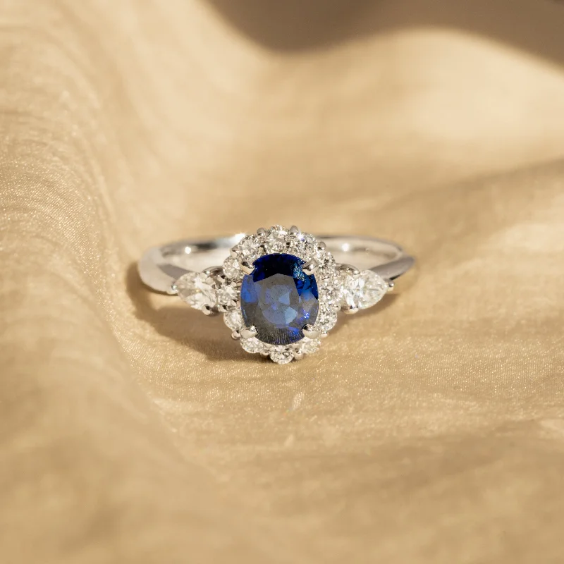 1.08 Carat Oval Natural Sapphire Diamond Halo Ring