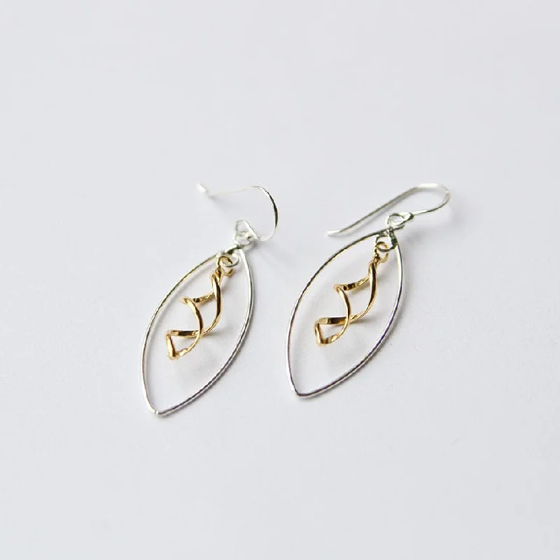 Silver Oval With Gold Swirl